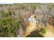 Aerial view of home with lake view and large backyard at 1126 Wedgefield Dr, Marietta, GA 30064