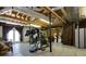 Finished basement with weight machines and flooring at 1126 Wedgefield Dr, Marietta, GA 30064