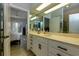 Bathroom with double vanity and access to bedroom at 1126 Wedgefield Dr, Marietta, GA 30064