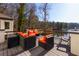 Deck overlooking lake with seating area at 1126 Wedgefield Dr, Marietta, GA 30064