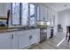 Kitchen features white cabinets, granite counters, and stainless steel appliances at 1126 Wedgefield Dr, Marietta, GA 30064