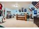 Spacious bedroom with wood bed frame, carpet, and sports memorabilia at 4340 Garmon Nw Rd, Atlanta, GA 30327