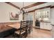 Charming breakfast nook with built-in bench seating and rustic table at 4340 Garmon Nw Rd, Atlanta, GA 30327