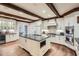 Modern kitchen with white cabinets, granite countertops, and high-end appliances at 4340 Garmon Nw Rd, Atlanta, GA 30327