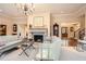 Elegant living room with a fireplace and hardwood floors at 4340 Garmon Nw Rd, Atlanta, GA 30327