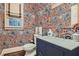 Charming powder room with unique wallpaper and stylish vanity at 4340 Garmon Nw Rd, Atlanta, GA 30327
