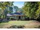 House exterior featuring stone accents and a covered porch at 5109 Cherry Ln, Powder Springs, GA 30127