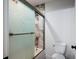 Bathroom with shower/tub combo and patterned tile floor at 2127 Nichols Ln, Decatur, GA 30032