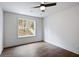 Bright bedroom with large window and hardwood floors at 2127 Nichols Ln, Decatur, GA 30032