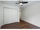 Bright bedroom with hardwood floors and double door closet at 2127 Nichols Ln, Decatur, GA 30032