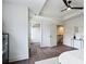 Spacious bedroom with hardwood floors and access to closets and upper level at 2127 Nichols Ln, Decatur, GA 30032