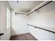 Walk-in closet with ample shelving and hanging space at 2127 Nichols Ln, Decatur, GA 30032