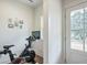 Small home gym with an exercise bike and natural light at 2127 Nichols Ln, Decatur, GA 30032