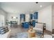 Open concept kitchen with island, stainless steel appliances, and blue cabinetry at 2127 Nichols Ln, Decatur, GA 30032