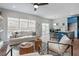 Open living space with comfy seating, large windows, and hardwood floors at 2127 Nichols Ln, Decatur, GA 30032