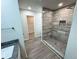 Modern bathroom featuring a walk-in shower with tile surround at 1351 E Atlanta E Rd, Stockbridge, GA 30281