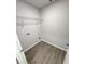 Laundry room with vinyl flooring and shelving at 1351 E Atlanta E Rd, Stockbridge, GA 30281