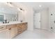 Elegant bathroom with dual vanities, a large mirror, and a glass shower at 2719 Byess Ct, Marietta, GA 30064