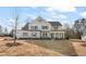 Two-story house with gray siding, a covered porch, and a well-manicured lawn at 2719 Byess Ct, Marietta, GA 30064