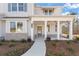 Inviting front porch with gray siding and brick accents at 2719 Byess Ct, Marietta, GA 30064