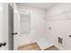 Convenient laundry room with closet and built-in shelving at 2719 Byess Ct, Marietta, GA 30064