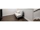 Finished basement area showcasing a seating space and access to the stairs at 290 Walker Ave, Alpharetta, GA 30076