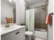 Bathroom featuring a vanity, a shower/tub combo, and modern fixtures at 290 Walker Ave, Alpharetta, GA 30076
