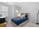 Bright bedroom with a built-in bed frame with storage and large window at 290 Walker Ave, Alpharetta, GA 30076