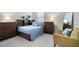 Stylishly furnished bedroom with a queen-sized bed, dressers and decor at 290 Walker Ave, Alpharetta, GA 30076