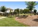 Community dog park featuring fenced-in area, well-maintained grass, and mature trees for shade and enjoyment at 290 Walker Ave, Alpharetta, GA 30076