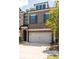 Well-maintained home showcasing a brick and siding exterior with a two-car garage at 290 Walker Ave, Alpharetta, GA 30076