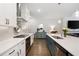 Bright kitchen with quartz countertops, stainless steel appliances, and a center island with seating at 290 Walker Ave, Alpharetta, GA 30076