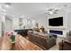Stylish living room and kitchen combination featuring an open layout, modern appliances, and a comfortable living area at 290 Walker Ave, Alpharetta, GA 30076