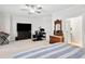 Open and bright main bedroom with a ceiling fan, walk in closet, and an ensuite bathroom at 290 Walker Ave, Alpharetta, GA 30076
