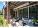 Charming outdoor patio with ample seating, a modern fire pit, and lush greenery offering a serene retreat at 290 Walker Ave, Alpharetta, GA 30076