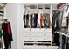 Well-organized walk-in closet with custom shelving and ample storage for clothing and accessories at 290 Walker Ave, Alpharetta, GA 30076
