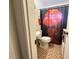 Bathroom showcasing a unique artistic shower curtain and tiled floors at 987 Forrest Se Cir, Atlanta, GA 30354