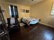 Cozy bedroom with a comfortable chair and a vibrant bedspread at 987 Forrest Se Cir, Atlanta, GA 30354