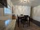 Dining room with a 4-chair table and granite countertop at 987 Forrest Se Cir, Atlanta, GA 30354
