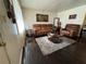 Bright living room with comfortable seating, accent rug and modern decor at 987 Forrest Se Cir, Atlanta, GA 30354