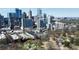 Aerial view of Midtown Atlanta, showing the cityscape and surrounding parkland at 273 12Th Ne St # 114, Atlanta, GA 30309