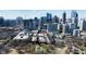 Aerial view of mid-rise buildings near city skyline at 273 12Th Ne St # 114, Atlanta, GA 30309