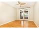 Hardwood floor bedroom with access to balcony at 273 12Th Ne St # 114, Atlanta, GA 30309