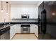 Modern kitchen with stainless steel appliances and granite countertops at 273 12Th Ne St # 114, Atlanta, GA 30309