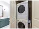 Stackable washer and dryer in convenient laundry closet at 273 12Th Ne St # 114, Atlanta, GA 30309