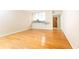 Hardwood floor living room with access to kitchen at 273 12Th Ne St # 114, Atlanta, GA 30309