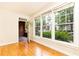 Bright living room with hardwood floors and private access to patio at 273 12Th Ne St # 114, Atlanta, GA 30309