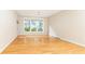 Bright living room featuring hardwood floors and large windows at 273 12Th Ne St # 114, Atlanta, GA 30309