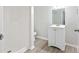 Clean bathroom with shower and white vanity at 558 Plainville Dr, Atlanta, GA 30331