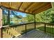 Wooden deck overlooking a pond at 558 Plainville Dr, Atlanta, GA 30331